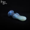 A fantasy sex toy on a black background with the Fantasy Grove logo in the upper left corner