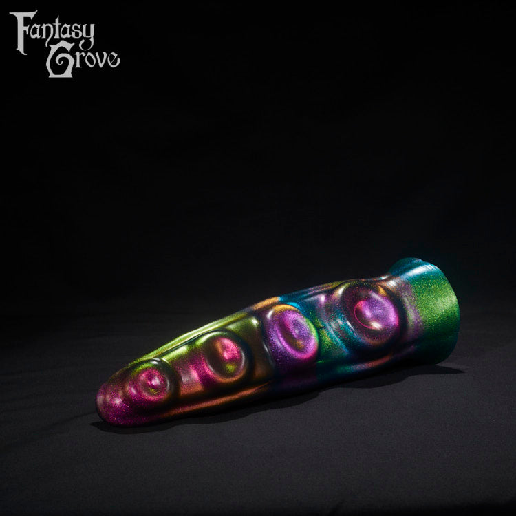 A Fantasy Grove sex toy on a black background with a logo in the upper left corner