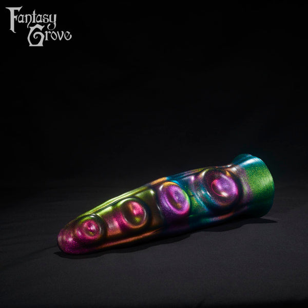 A Fantasy Grove sex toy on a black background with a logo in the upper left corner
