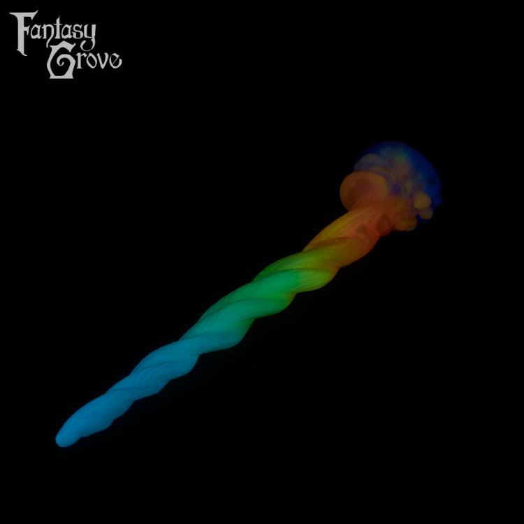 A Fantasy Grove sex toy on a black background with a logo in the upper left corner