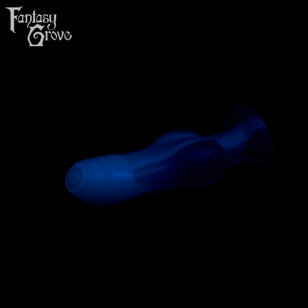 A fantasy sex toy on a black background with the Fantasy Grove logo in the upper left corner