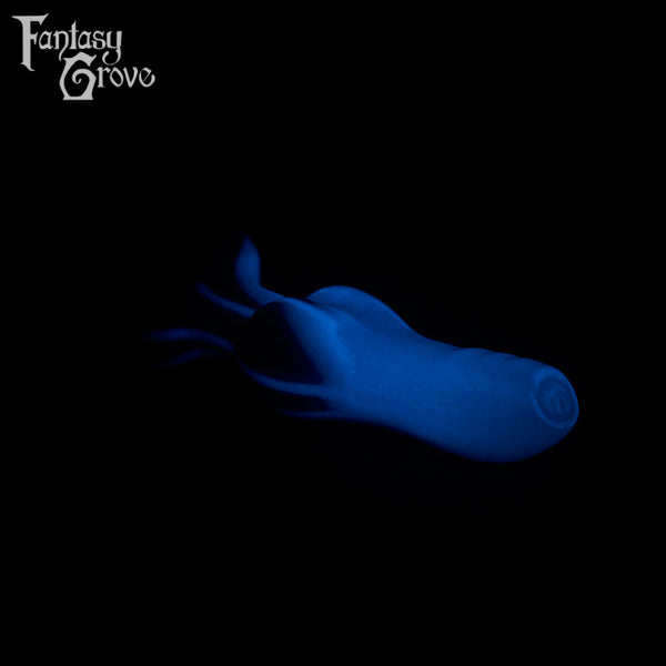 A fantasy sex toy on a black background with the Fantasy Grove logo in the upper left corner