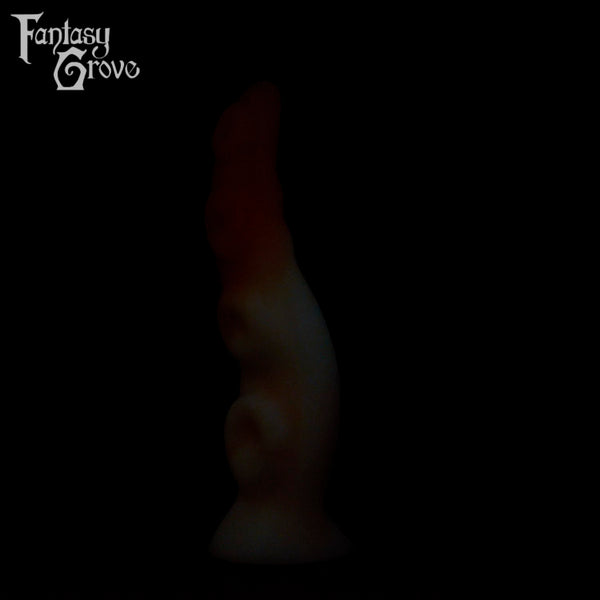 A fantasy sex toys on a black background with Fantasy Grove branding
