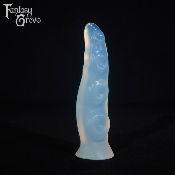 A fantasy sex toy on a black background with the Fantasy Grove logo in the upper left corner