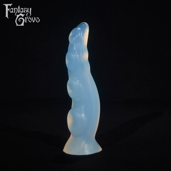 A fantasy sex toy on a black background with the Fantasy Grove logo in the upper left corner