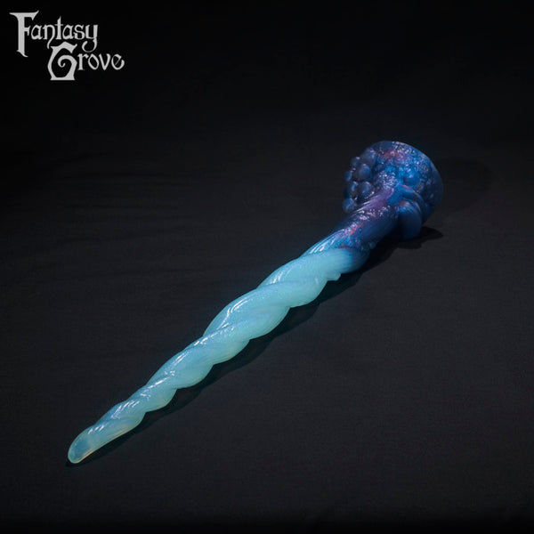 A Fantasy Grove sex toy on a black background with a logo in the upper left corner