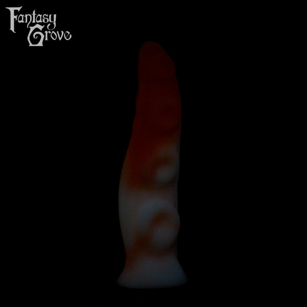 A fantasy sex toys on a black background with Fantasy Grove branding