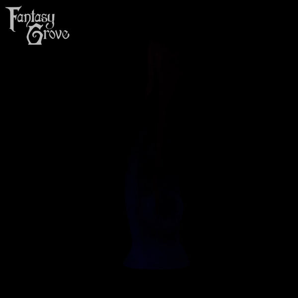 A fantasy sex toy on a black background with the Fantasy Grove logo in the upper left corner 