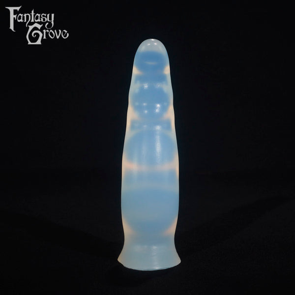 A fantasy sex toy on a black background with the Fantasy Grove logo in the upper left corner
