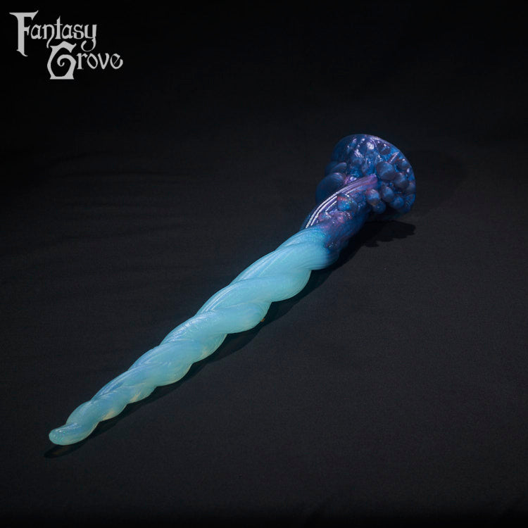 A Fantasy Grove sex toy on a black background with a logo in the upper left corner