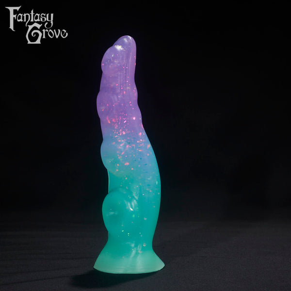A fantasy sex toys on a black background with Fantasy Grove branding