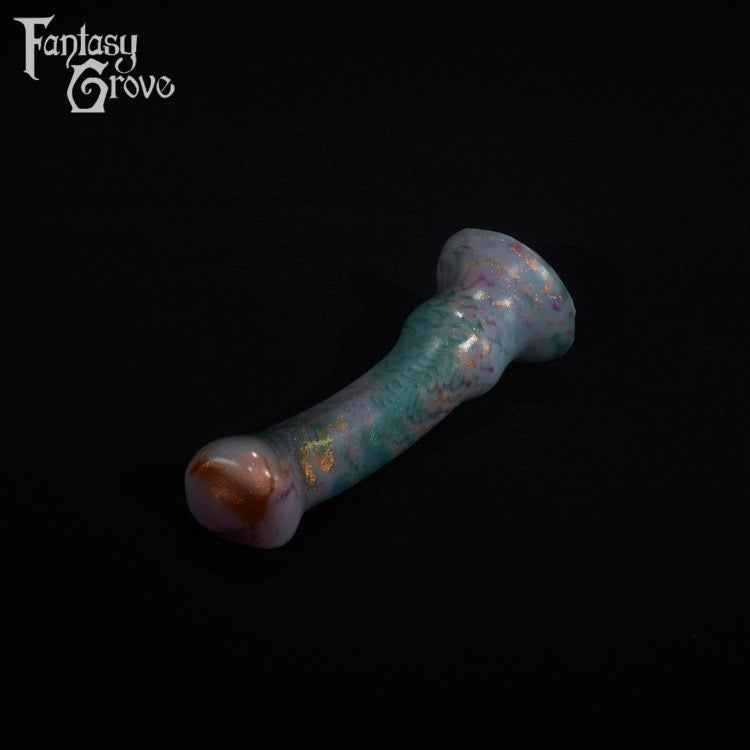A fantasy sex toy on a black background with the Fantasy Grove logo in the upper left corner