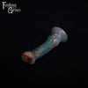 A fantasy sex toy on a black background with the Fantasy Grove logo in the upper left corner