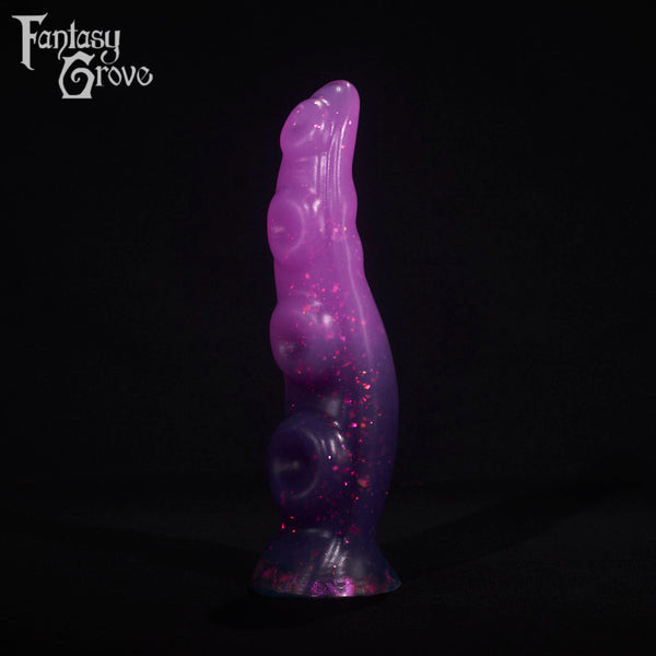 A fantasy sex toy on a black background with the Fantasy Grove logo in the upper left corner