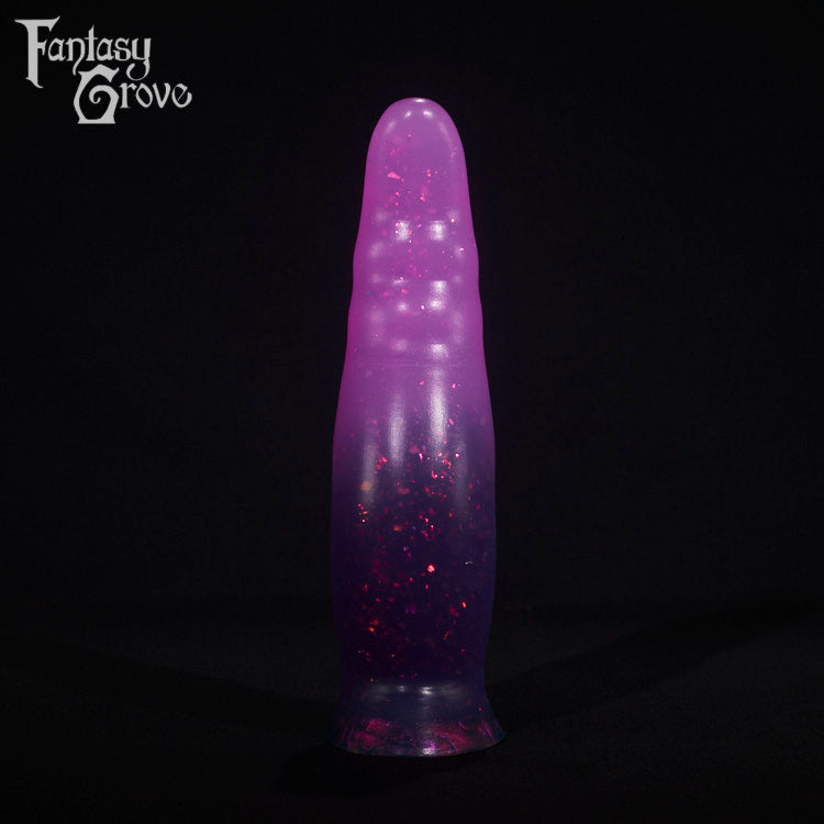 A fantasy sex toy on a black background with the Fantasy Grove logo in the upper left corner