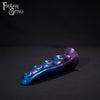 A fantasy sex toy on a black background with the Fantasy Grove logo in the upper left corner 