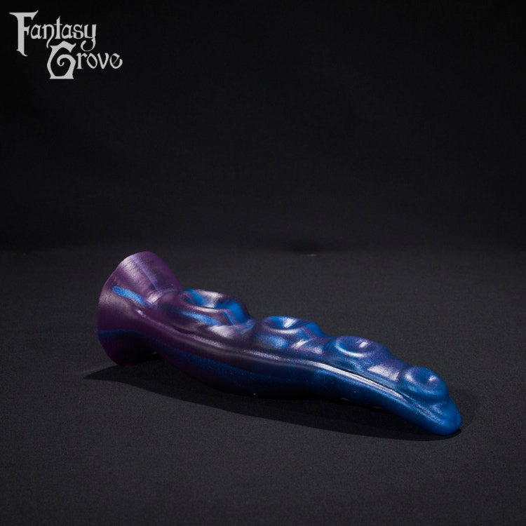 A fantasy sex toy on a black background with the Fantasy Grove logo in the upper left corner 