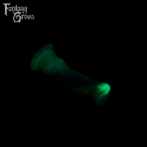 A fantasy sex toy on a black background with the Fantasy Grove logo in the upper left corner