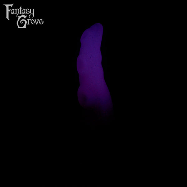 A fantasy sex toy on a black background with the Fantasy Grove logo in the upper left corner