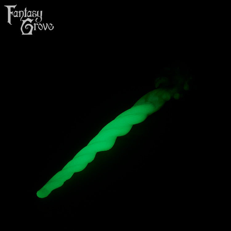 A Fantasy Grove sex toy on a black background with a logo in the upper left corner