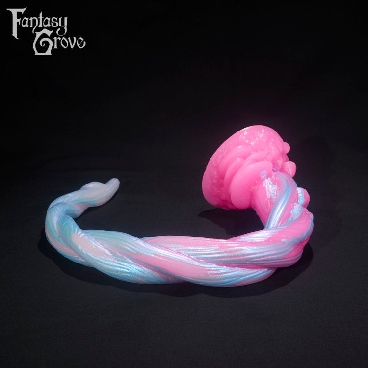 A Fantasy Grove sex toy on a black background with a logo in the upper left corner