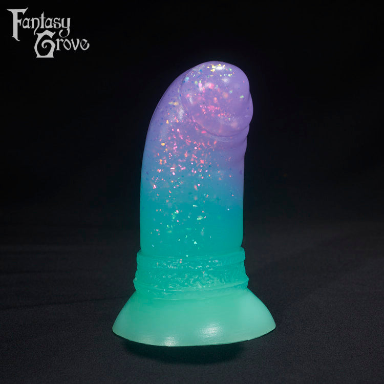 A Fantasy Grove sex toy on a black background with a logo in the upper left corner
