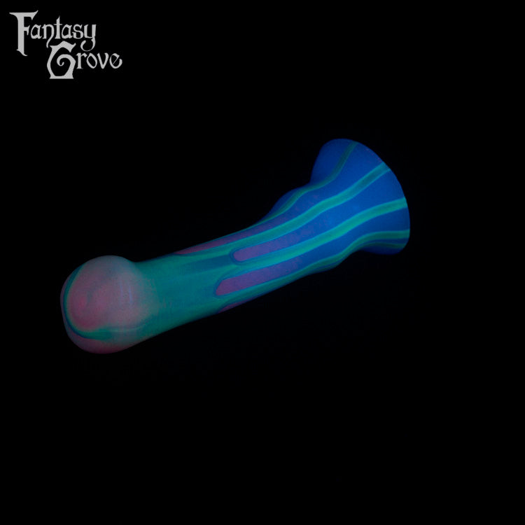 A fantasy sex toy on a black background with the Fantasy Grove logo in the upper left corner