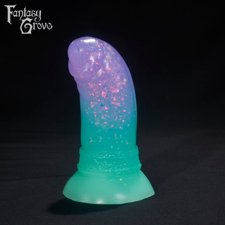 A Fantasy Grove sex toy on a black background with a logo in the upper left corner