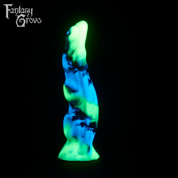 A fantasy sex toy on a black background with the Fantasy Grove logo in the upper left corner