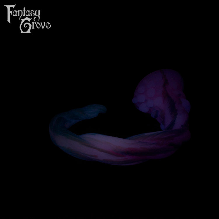 A Fantasy Grove sex toy on a black background with a logo in the upper left corner