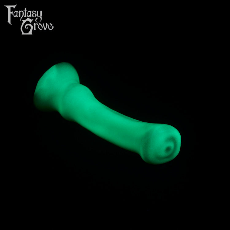 A fantasy sex toy on a black background with the Fantasy Grove logo in the upper left corner