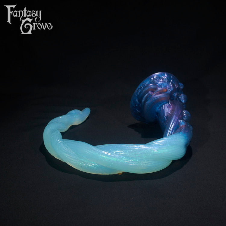 A Fantasy Grove sex toy on a black background with a logo in the upper left corner