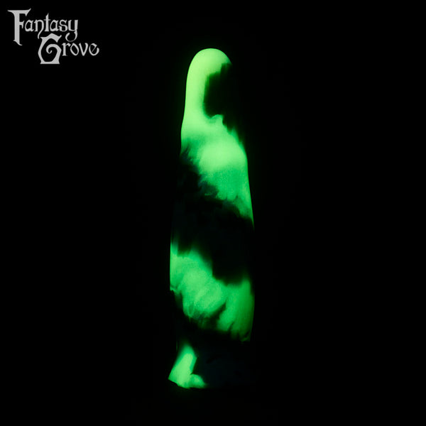 A fantasy sex toy on a black background with the Fantasy Grove logo in the upper left corner