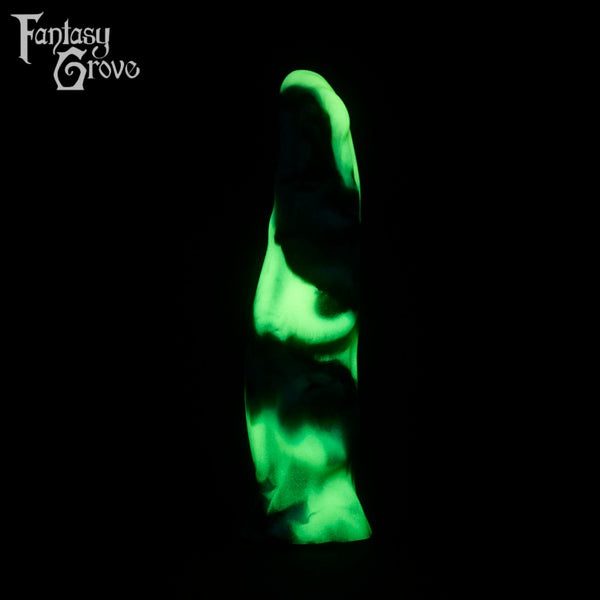 A fantasy sex toy on a black background with the Fantasy Grove logo in the upper left corner