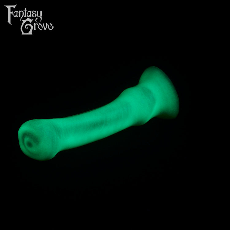 A fantasy sex toy on a black background with the Fantasy Grove logo in the upper left corner