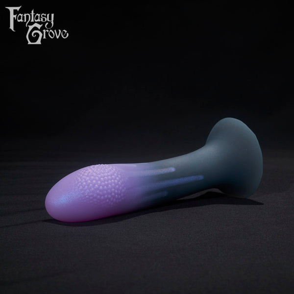 A fantasy sex toys on a black background with Fantasy Grove branding