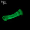 A fantasy sex toy on a black background with the Fantasy Grove logo in the upper left corner