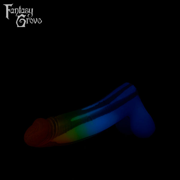 A Fantasy Grove sex toy on a black background with a logo in the upper left corner