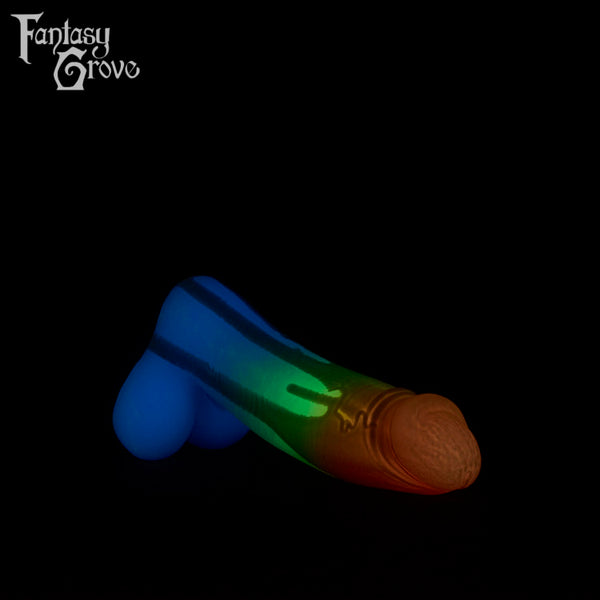 A Fantasy Grove sex toy on a black background with a logo in the upper left corner