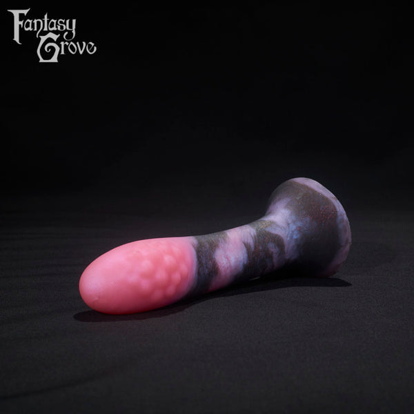 A fantasy sex toys on a black background with Fantasy Grove branding