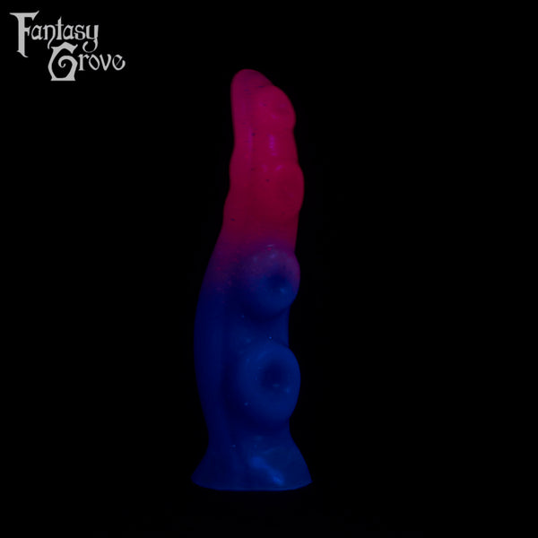 A fantasy sex toy on a black background with the Fantasy Grove logo in the upper left corner