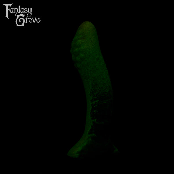 A fantasy sex toy on a black background with the Fantasy Grove logo in the upper left corner 