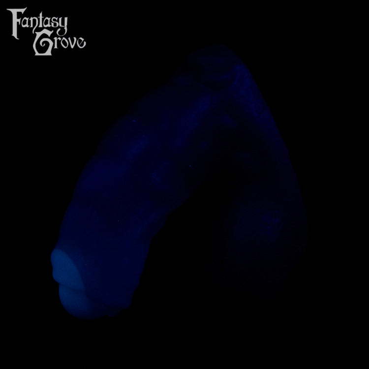 A fantasy sex toy on a black background with the Fantasy Grove logo in the upper left corner