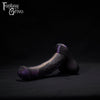 A Fantasy Grove sex toy on a black background with a logo in the upper left corner