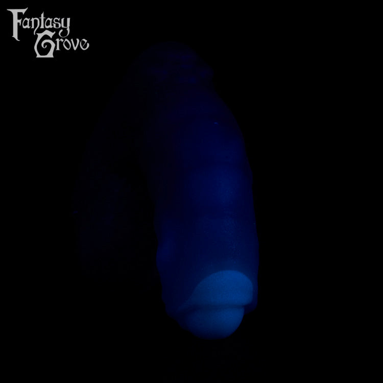 A fantasy sex toy on a black background with the Fantasy Grove logo in the upper left corner