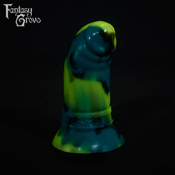 A fantasy sex toy on a black background with the Fantasy Grove logo in the upper left corner