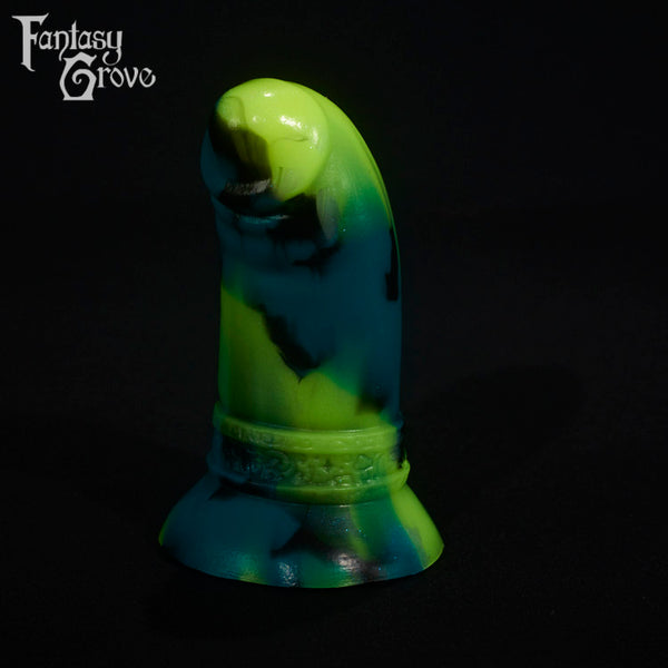 A fantasy sex toy on a black background with the Fantasy Grove logo in the upper left corner