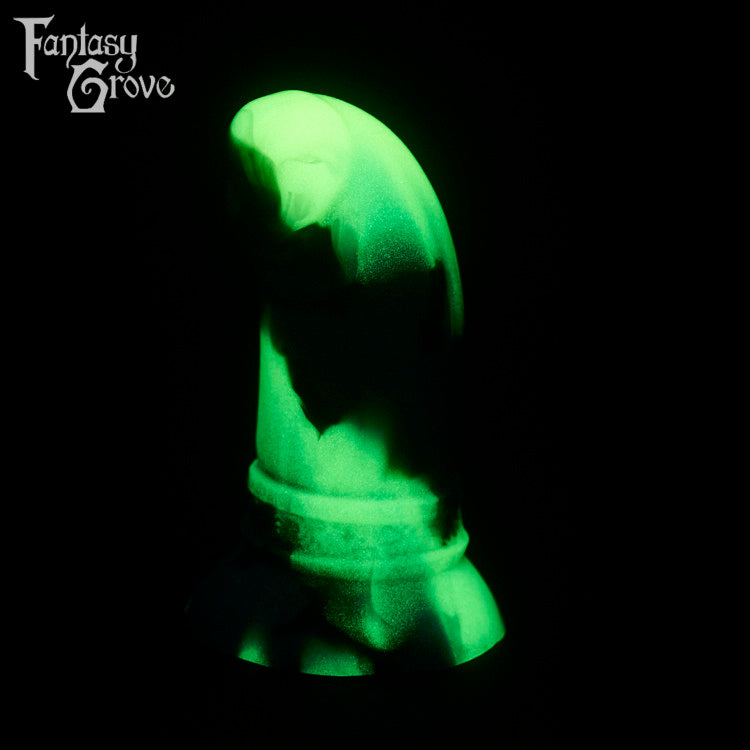 A fantasy sex toy on a black background with the Fantasy Grove logo in the upper left corner