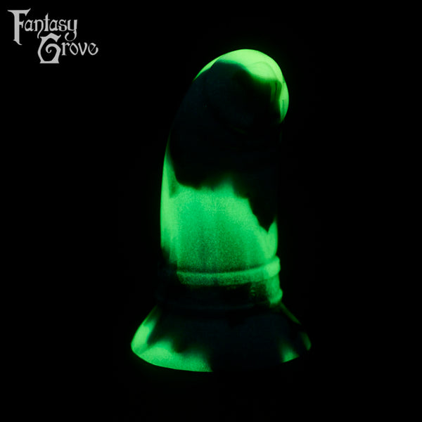 A fantasy sex toy on a black background with the Fantasy Grove logo in the upper left corner