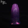 A fantasy sex toy on a black background with the Fantasy Grove logo in the upper left corner
